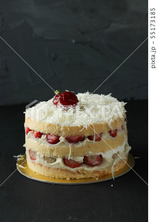 Strawberry cake on a black background 55173185