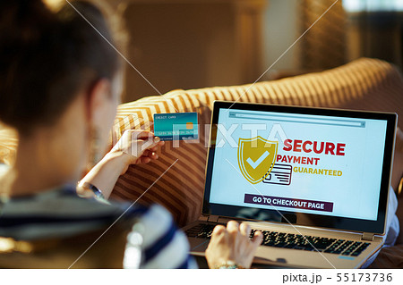 housewife making safe online shopping on e-commerce website on l housewife making safe online shopping on e-commerce website on l 55173736