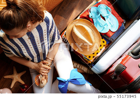 stylish woman with summer holiday stuff stylish woman with summer holiday stuff 55173945