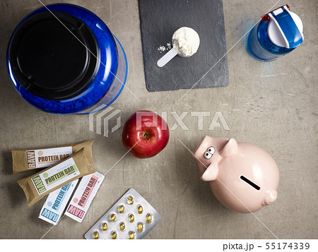 big protein jar, sport supplements in tablets and piggy bank big protein jar, sport supplements in tablets and piggy bank 55174339