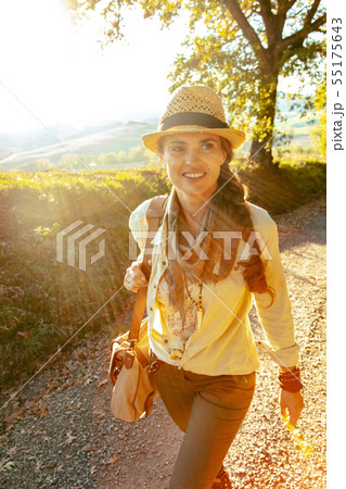 happy healthy traveller woman having walking tour 55175643