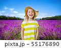 child in lavender field in Provence, France in straw hat 55176890