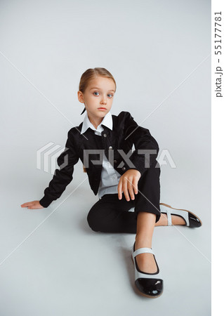 Girl preparing for school after a long summer break. Back to school. Girl preparing for school after a long summer break. Back to school. 55177781