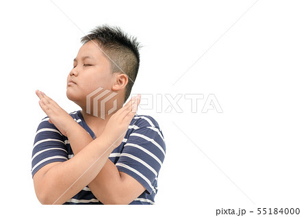 serious obese fat boy showing crossed hands 55184000