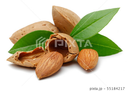 Almonds and green leaves isolated on white Almonds and green leaves isolated on white 55184217