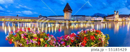 Lucerne. The famous Chapel, Kapellbrucke bridge at dawn in night lighting. Lucerne. The famous Chapel, Kapellbrucke bridge at dawn in night lighting. 55185429