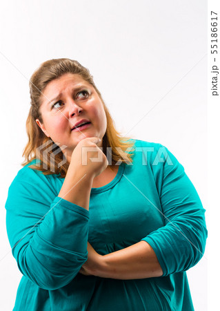 Fatty woman with her hand on chin thinking Fatty woman with her hand on chin thinking 55186617