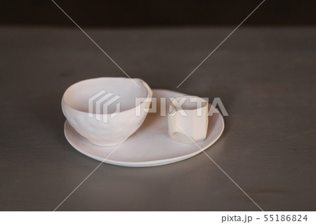 Ceramic cup for tea coffee and plate on the table Ceramic cup for tea coffee and plate on the table 55186824
