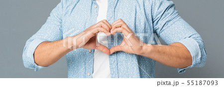 Heart-Shaped Male Hands Gesture Closeup On Gray Background 55187093