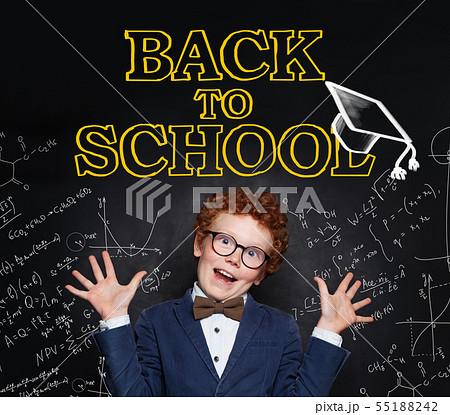 Child boy with ginger hair on chalkboard portrait. 55188242