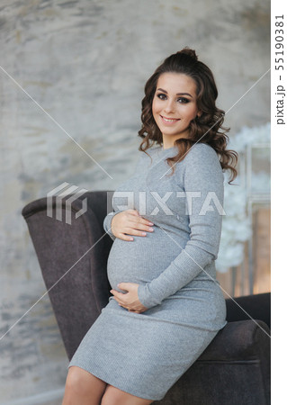 Beautiful close up portrait pf elegant pregnant woman. Fashion pregnant model with charming Beautiful close up portrait pf elegant pregnant woman. Fashion pregnant model with charming 55190381