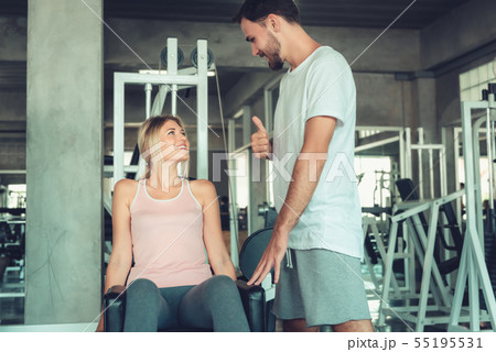Portrait of Beautiful Woman is Exercising Portrait of Beautiful Woman is Exercising 55195531