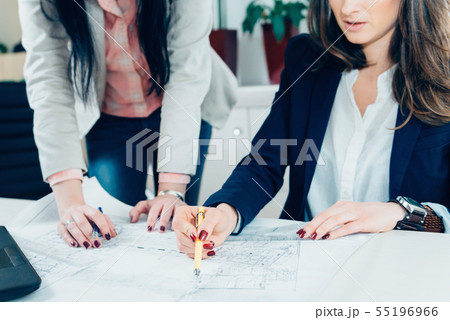 Architects discussing 55196966