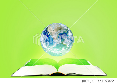 Planet earth globe floating over opened book. 55197072