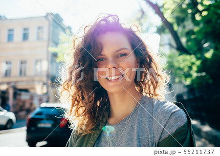Portrait of smiling young woman Portrait of smiling young woman 55211737