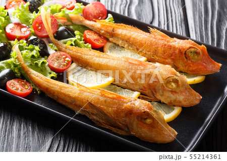 Roasted Triglidae or gurnard fish served with Roasted Triglidae or gurnard fish served with 55214361