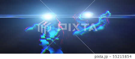 Couple with virtual reality headset are playing game. Image with glitch effect. Couple with virtual reality headset are playing game. Image with glitch effect. 55215854