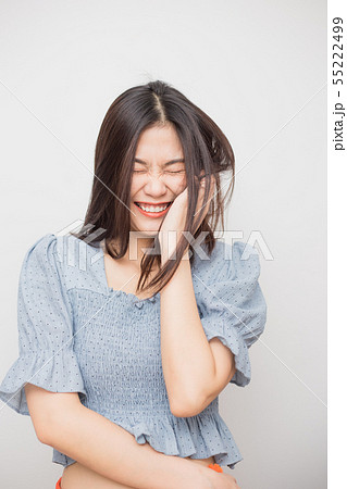 Laughing of beautiful asian women on white Laughing of beautiful asian women on white 55222499