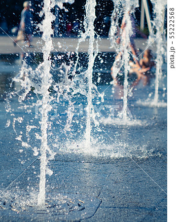 Water drops from dry fountain splashing on granite Water drops from dry fountain splashing on granite 55222568