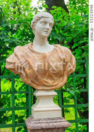 Sculpture of young woman in a pink drapery  55223046