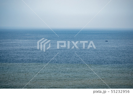 Calm sea surface with boat Calm sea surface with boat 55232956