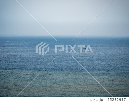 Calm sea surface with boat 55232957