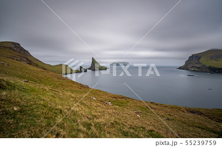 Top view long exposure of Drangarnir gate, Tindholmur and Mykines, ultra wide angle Top view long exposure of Drangarnir gate, Tindholmur and Mykines, ultra wide angle 55239759
