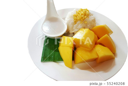 Mango sticky rice on a white plate,selective focus Mango sticky rice on a white plate,selective focus 55240208
