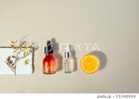 Natural cosmetic with vitamin C. Skin beauty health care concept. Flat lay Natural cosmetic with vitamin C. Skin beauty health care concept. Flat lay 55240939