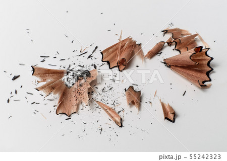 Pencil sharpener wooden swirl shavings on white Pencil sharpener wooden swirl shavings on white 55242323