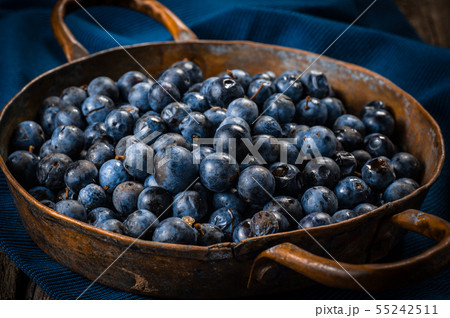 Fresh blueberries in copper dishes. Healthy food Fresh blueberries in copper dishes. Healthy food 55242511
