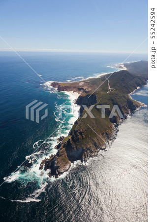 Aerial view of Cape point with lighthouse and Cape of Good Hope from a helicopter. Panorama of South 55242594