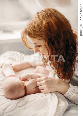 Artificial breastfeeding, bottle feeding the baby. Maternity lifestyle concept. 55248477