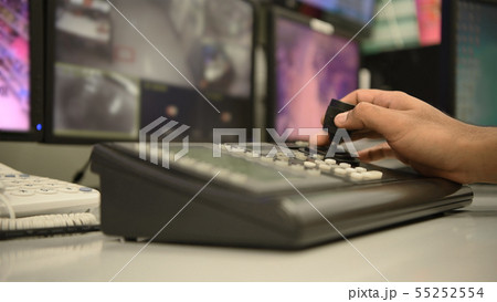 The hands of the officers are controlling the keys The hands of the officers are controlling the keys 55252554