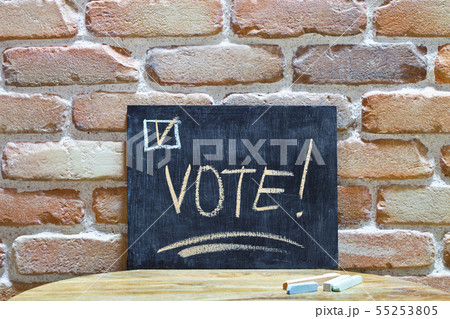 Chalk board with the word VOTE! drown by hand and 55253805