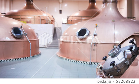 Equipment for preparation of beer. Lines of cooper tanks in brewery. Manufacturable process of 55263822