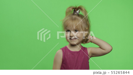 Positive blonde girl in purple dress. Pretty little blonde child. Chroma Key 55265844