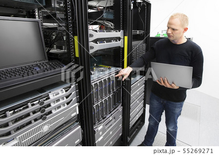 It consultant monitors blade servers in datacenter It consultant monitors blade servers in datacenter 55269271