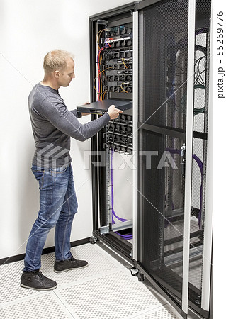 IT consultant build network rack in datacenter IT consultant build network rack in datacenter 55269776