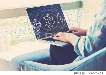 Cryptocurrency - Bitcoin, Ethereum, Litecoin with woman using laptop Cryptocurrency - Bitcoin, Ethereum, Litecoin with woman using laptop 55274741