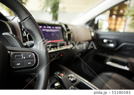 selective focus of steering wheel near gear shift handle in luxury car selective focus of steering wheel near gear shift handle in luxury car 55280383