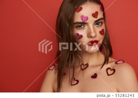 Happy beautiful girl looking at camera in gym 55281243