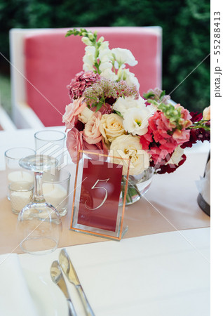 Festive wedding table setting. Empty wine glasses Festive wedding table setting. Empty wine glasses 55288413