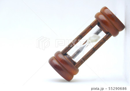 Wooden sandglass lay on white background. 55290686