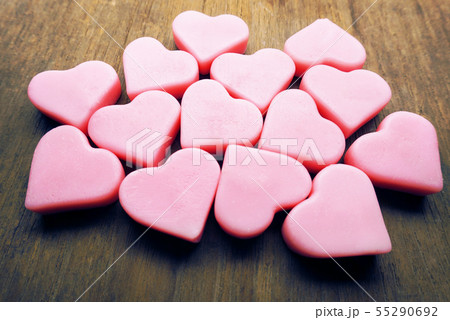 Vintage pink hearts grouping on wood table, love Vintage pink hearts grouping on wood table, love 55290692