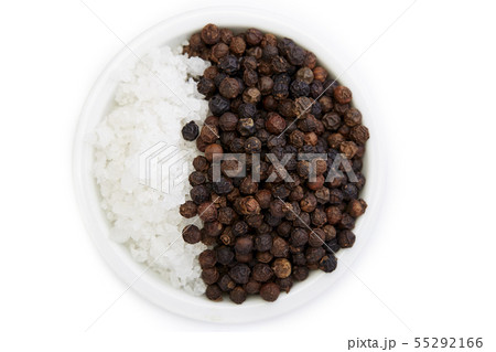 Bowl of black pepper with salt on white Bowl of black pepper with salt on white 55292166