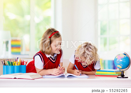 Kids doing homework. Children go back to school. Kids doing homework. Children go back to school. 55292265