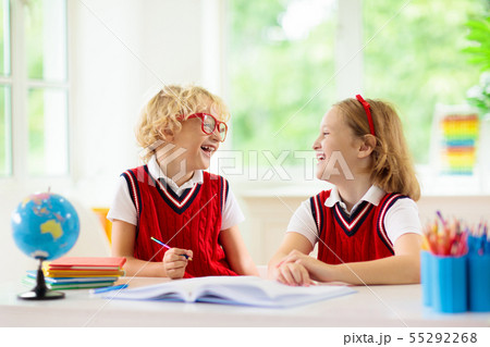 Kids doing homework. Children go back to school. Kids doing homework. Children go back to school. 55292268
