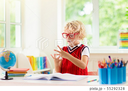 Kids doing homework. Children go back to school. Kids doing homework. Children go back to school. 55292328