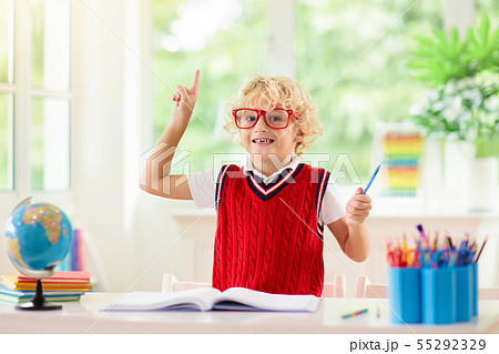 Kids doing homework. Children go back to school. Kids doing homework. Children go back to school. 55292329